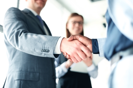 two people shaking hands
