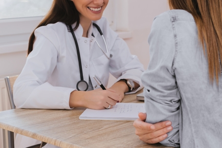 doctor speaking to patient